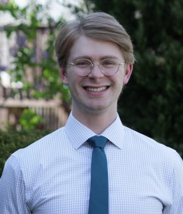 pro headshot photo of liam redinger